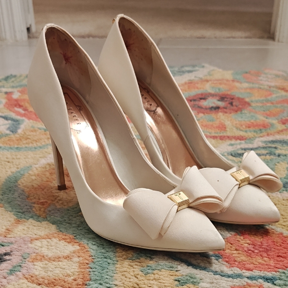 Ted Baker London Ivory Bow Pointed-Toe Heels with Gold Accent